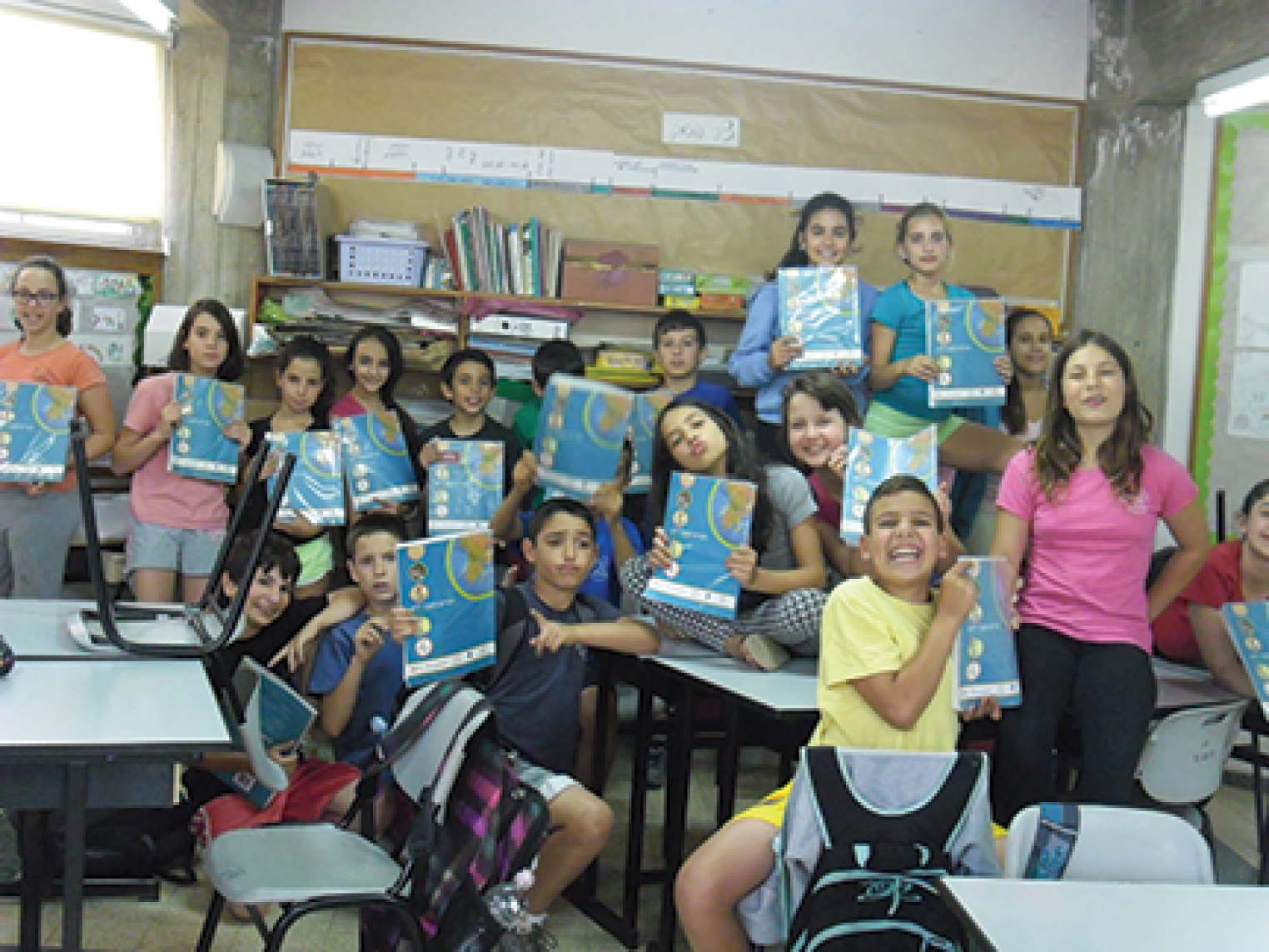 Friends Across the Sea- Israeli Children Holding Up Books