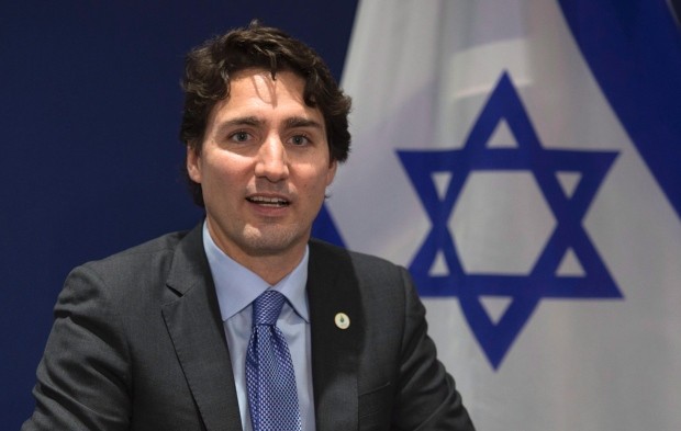 PM of Canada Justin Trudeau in front of israeli flag