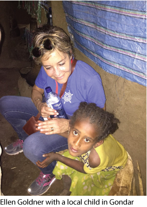 Ellen Goldner with a local child in Gondar