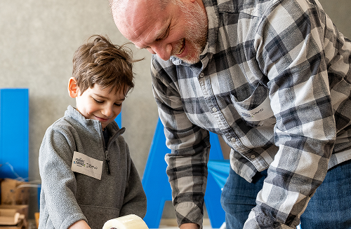 Senior and child volunteering