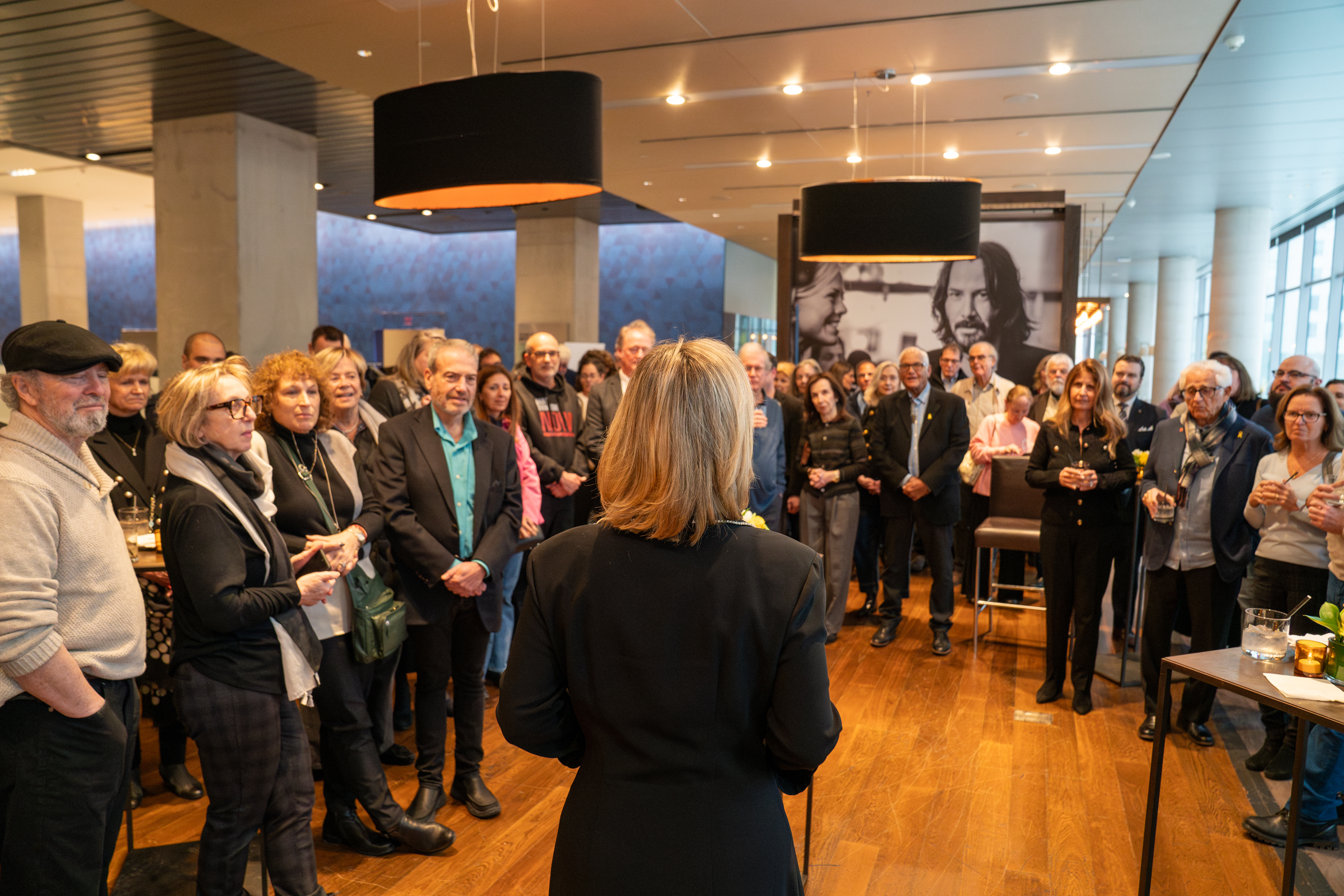people outside the theatre at the reception