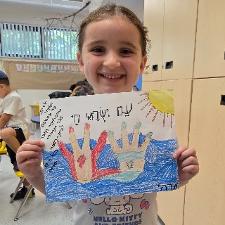 Child/children holding signs of supprt