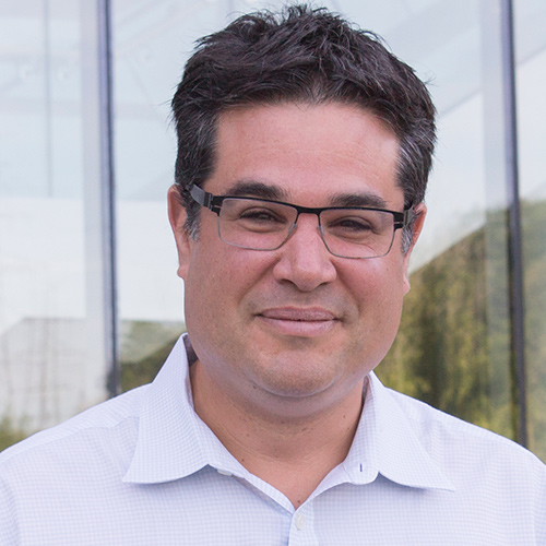 adam-minsky-hi-res.jpg a man wearing glasses