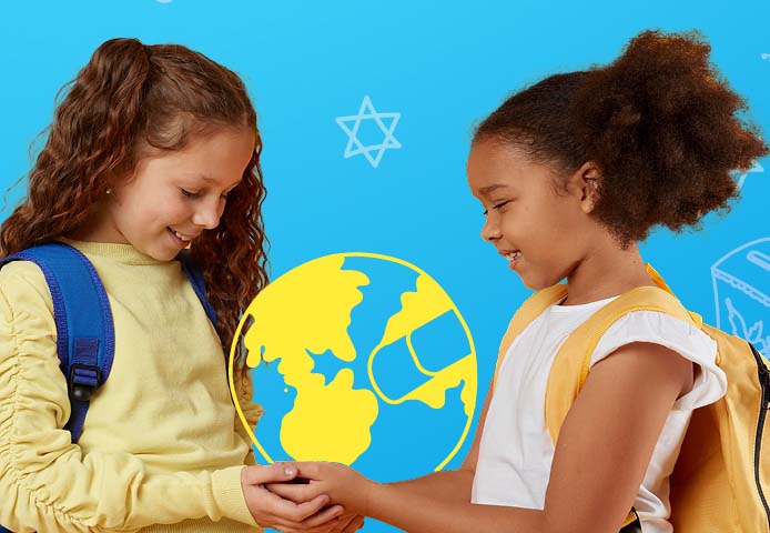 2 Jewish students holding hands around a globe