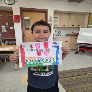 Child/children holding signs of supprt