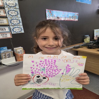 Child/children holding signs of supprt