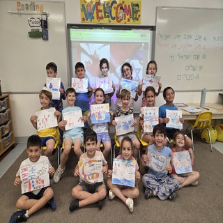 Child/children holding signs of supprt