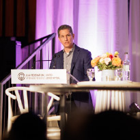 A UJA rep speaking at an event