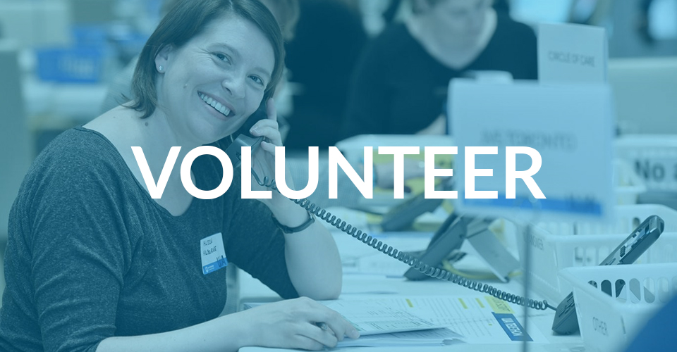 A volunteer speaking on the phone