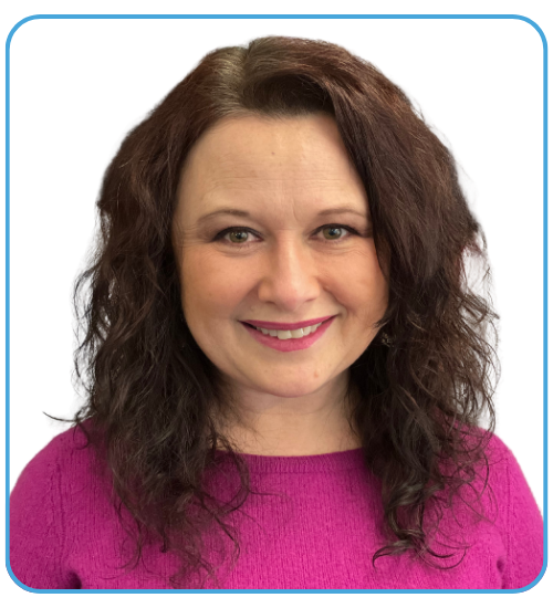 Brightly smiling, facing forward in a portrait.